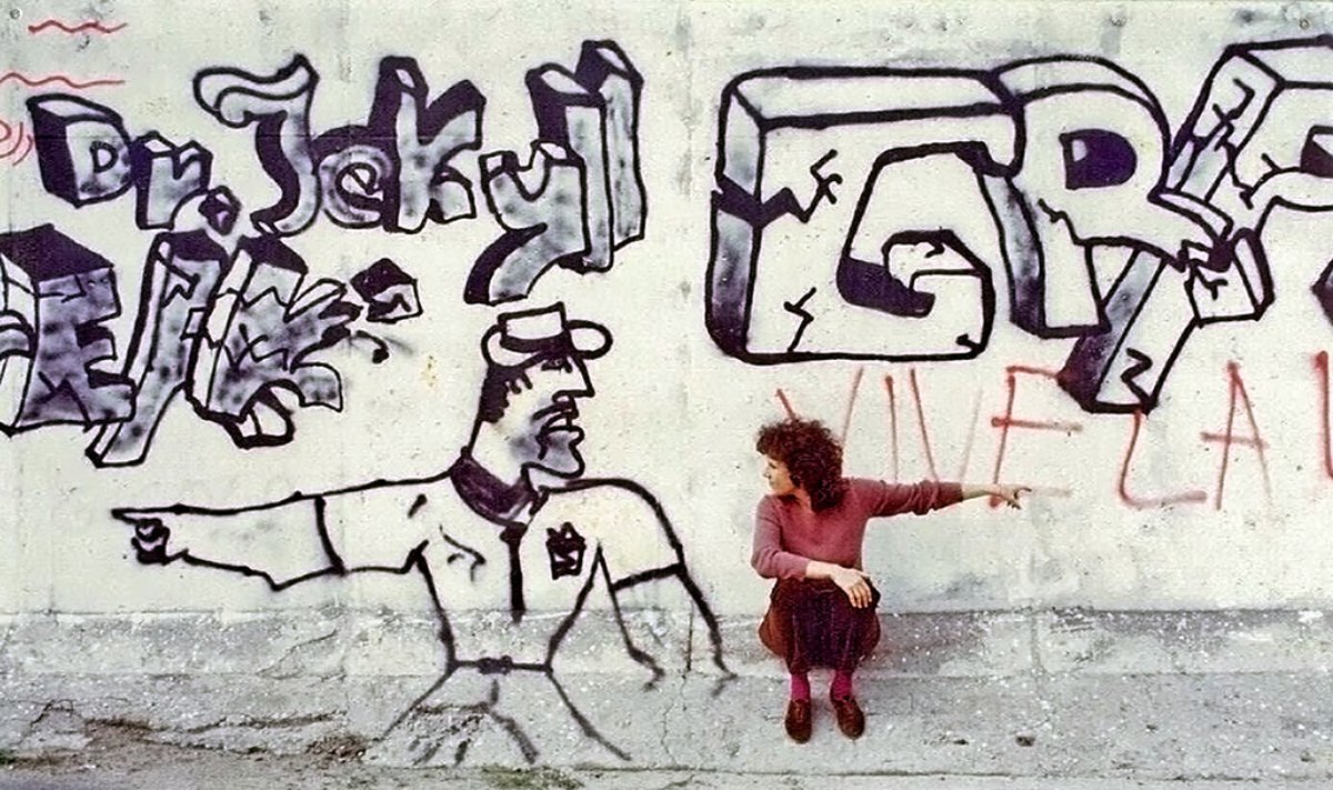 Irene Angelico at the Berlin Wall, 1980s - Photo Courtesy DLI Productions