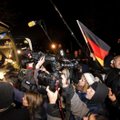 Dėl migrantų trūko kantrybė: pilną autobusą pasiuntė A. Merkel