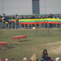 Marijampolės J. Totoraičio mokyklos mokiniai kūrė ilgiausią Lietuvos vėliavą