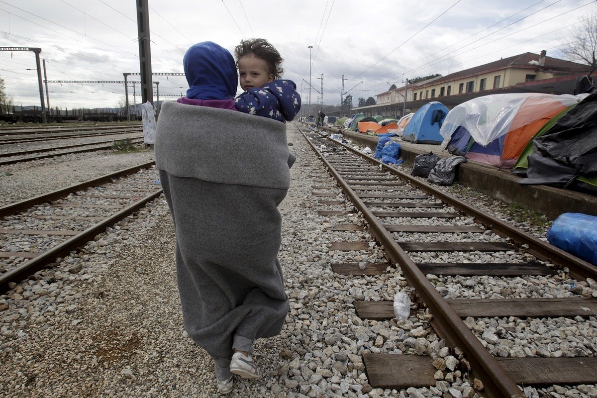 In Italia un gruppo criminale e un’organizzazione cattolica si approfittano dei migranti