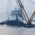 Kinijoje nuskendus laivui vilkikui žuvo mažiausiai 21 žmogus