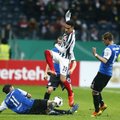 „Eintracht“ – Vokietijos taurės pusfinalyje, „Borussia“ nežaidė dėl snygio