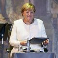 Merkel pelnė prestižinį apdovanojimą už pabėgėlių globą