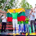 Olimpiečiams įteikta Lietuvos žmonių sukurta trispalvė