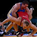 TOK iš dopingą vartojusio Rusijos imtynininko atėmė Pekino olimpiados medalį