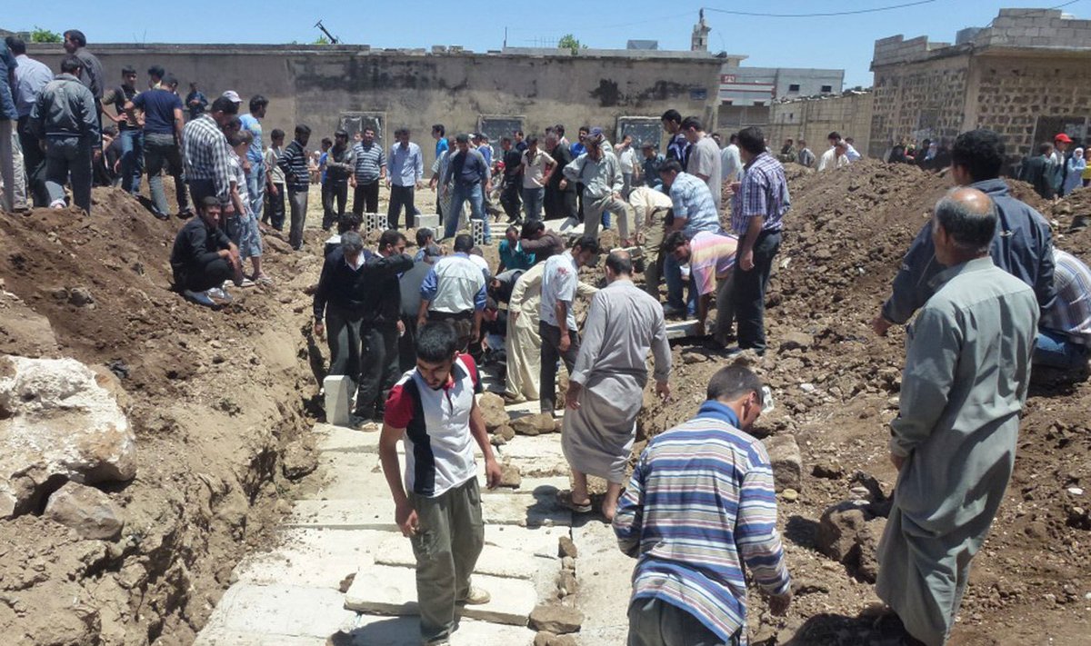 Masinė kapavietė po žudynių Huloje, Sirijoje