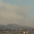 Kalifornijoje tūkstančiai žmonių bėga nuo sparčiai plintančio miško gaisro
