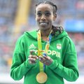 Fantastika: auksą iškovojusi bėgikė pasaulio rekordą pagerino net 14,33 sek.