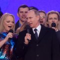 Prie Kremliaus – minios žmonių, pasirodė ir V. Putinas