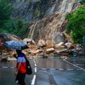 Rekordinis lietus Honkonge pražudė du žmones, daugiau kai 100 sužeisti