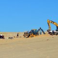 Šešiametį trims valandoms palaidojo milžiniška smėlio kopa