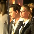 Johnny Deppas ir Amber Heard pasiekė skyrybų susitarimą
