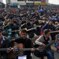 600 Indijos gitaristų pagerbė grupinio išžaginimo auką