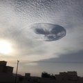 ФОТО, ВИДЕО: облака с дырой удивили жителей ОАЭ и Омана, навеяв мысли об инопланетянах