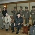 Šiaurės Korėjos lyderis su žmona apsilankė sporto klube