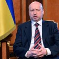 O. Turčynovas pasirašė įstatymą dėl ypatingo savivaldos statuso Donbase