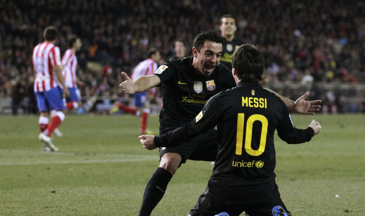 Xavi ir Lionelis Messi