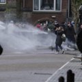 Nyderlandų premjeras smerkia „nusikalstamą smurtą“ per protestus dėl komendanto valandos