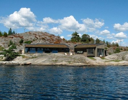 Namas ant ežero kranto („Skaara Architekter“ nuotr.)