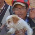Benamis šuo nubėgo beveik 2 tūkst. kilometrų su kinų dviratininkais