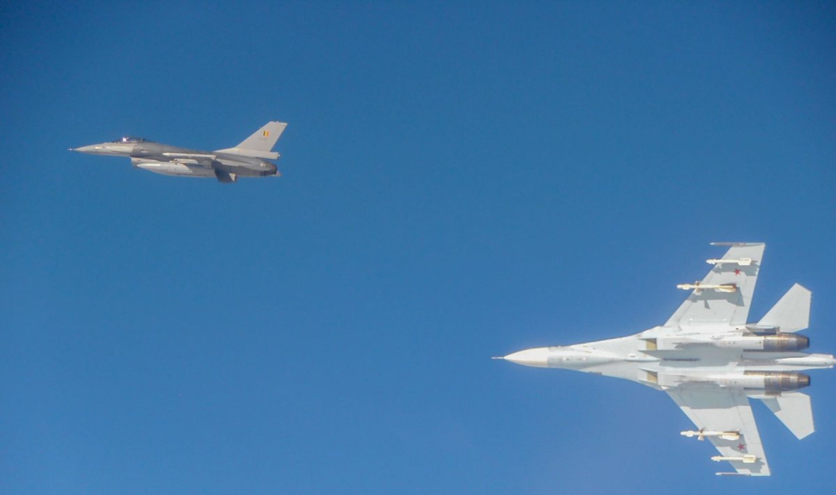  NATO fighter-jets escorting Russian fighter-jet