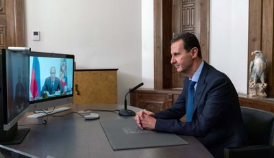 Sirijos prezidentas Basharas Assadas klausosi Putino