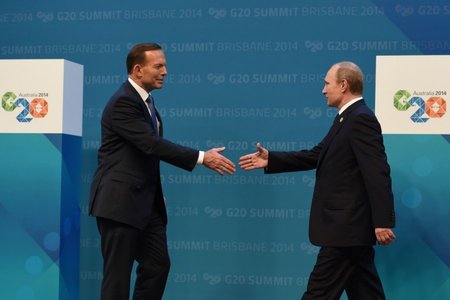  Tony Abbottas ir Vladimiras Putinas