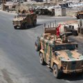 Nepaisant Trumpo grasinimų „sugriauti ekonomiką“, Turkija telkia pajėgas puolimui