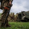 Rusai bandė pralaužti gynybos liniją Charkivo srityje, mūšiai tęsiasi