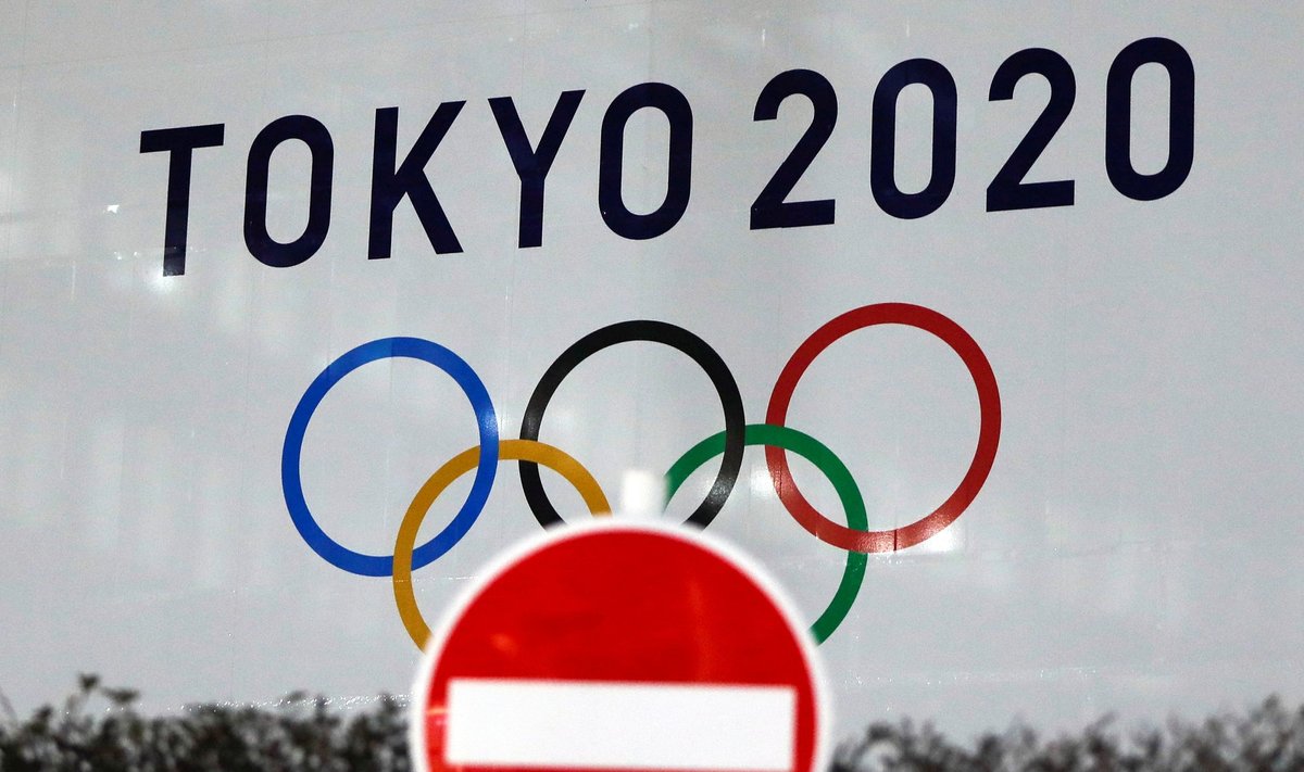 Olimpinių žaidynių simbolis ir stop ženklas Tokijuje