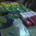 Narkotikų prekeiviai atsarginėje padangoje gabeno 1,1 mln. JAV dolerių