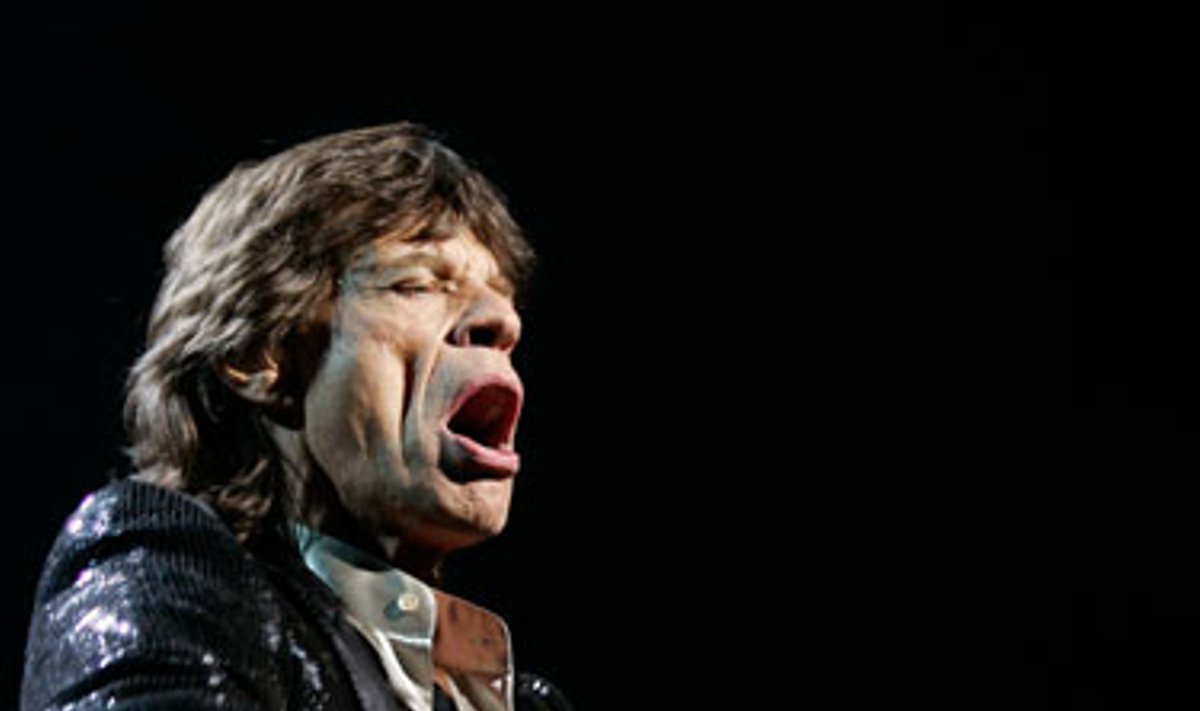 “Rolling Stones” dainininkas Mickas Jaggeris koncertuoja Niujorke. 
