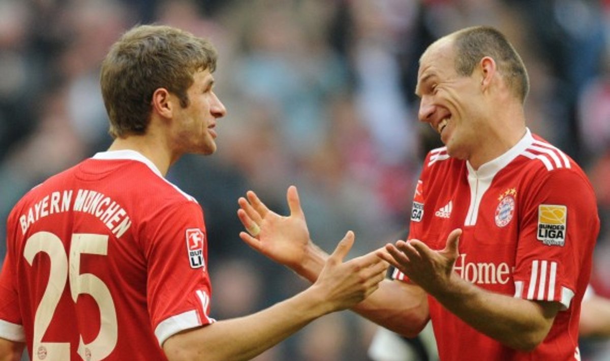 Thomas Muelleris ir Arjenas Robbenas ("Bayern") 