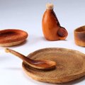 Menininkas sukūrė indus iš apelsino žievės