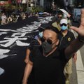 Honkonge draudimas protestuotojams dėvėti kaukes sukėlė naują susirėmimų bangą
