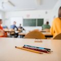 Gruzijoje panaikinami baigiamieji mokykliniai egzaminai