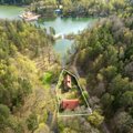 Aukcione parduodami pastatai prestižinėje Vilniaus vietoje, prie ežero