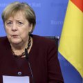 Merkel tikisi „miegoti ramiai“ prie Scholzo vyriausybės