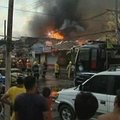 Bandoma užgesinti didžiulį gaisrą Manilos lūšnynų kvartale