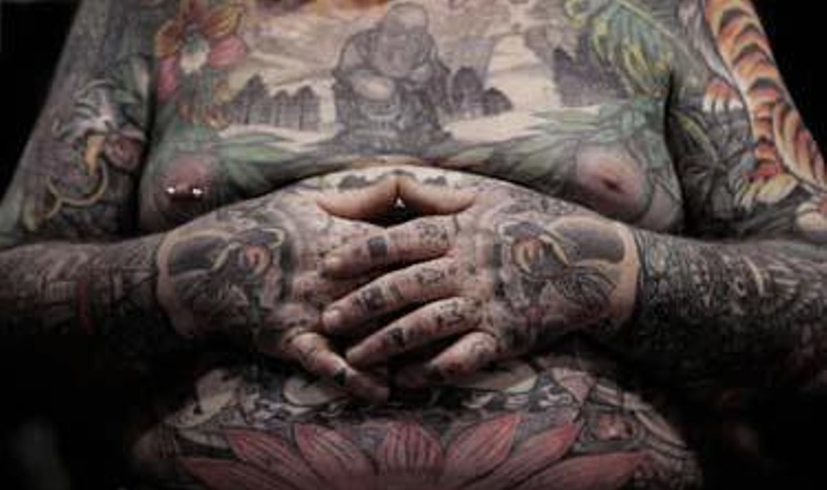 Richardas Carsonas iš Mičigano (JAV) dalyvauja Tarptautiniame tatuiruočių meno festivalyje Bankoke.