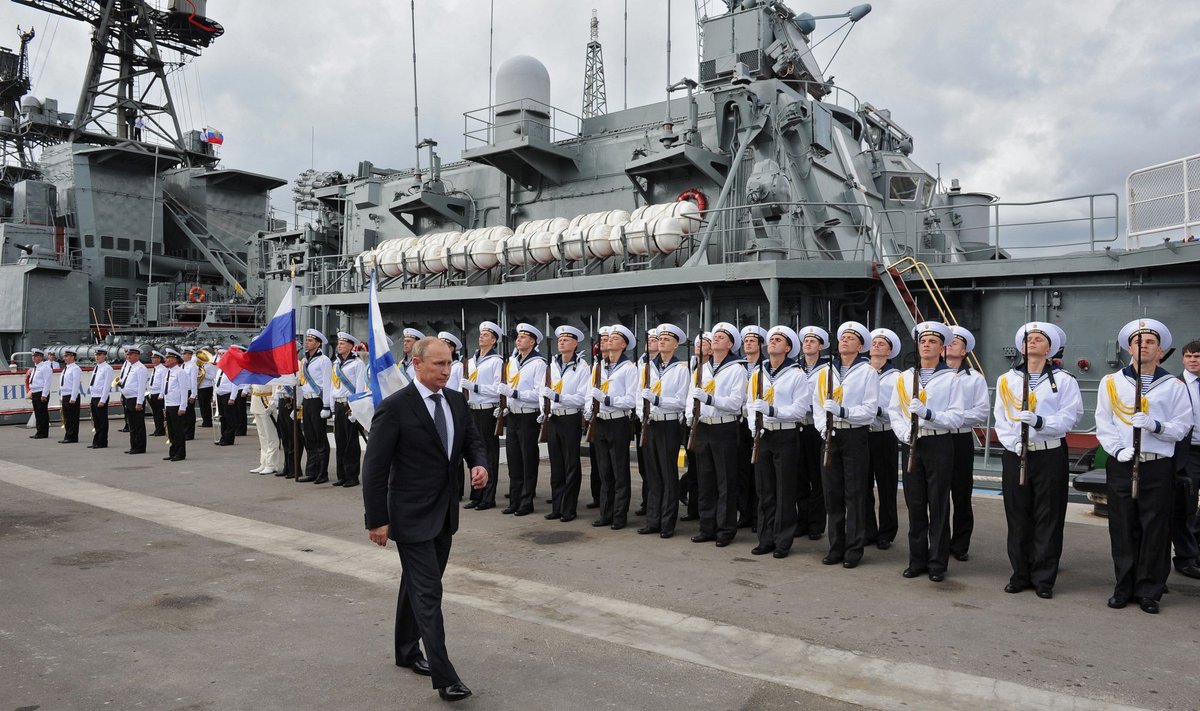 Vladimir Putin and Russian navy soldiers