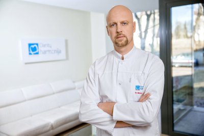 Implantuojantis gydytojas Marius Bučinskas
