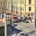 Серьезное ДТП в Каунасе: столкнулись BMW и Opel, один автомобиль перевернулся