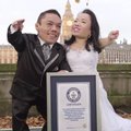 Guinnesso rekordų diena: žemiausia jaunavedžių pora, magijos triukai ore ir greitoji papūga