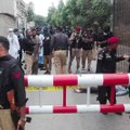 Karačyje ginkluoti užpuolikai įsiveržė į Pakistano vertybinių popierių biržos pastatą