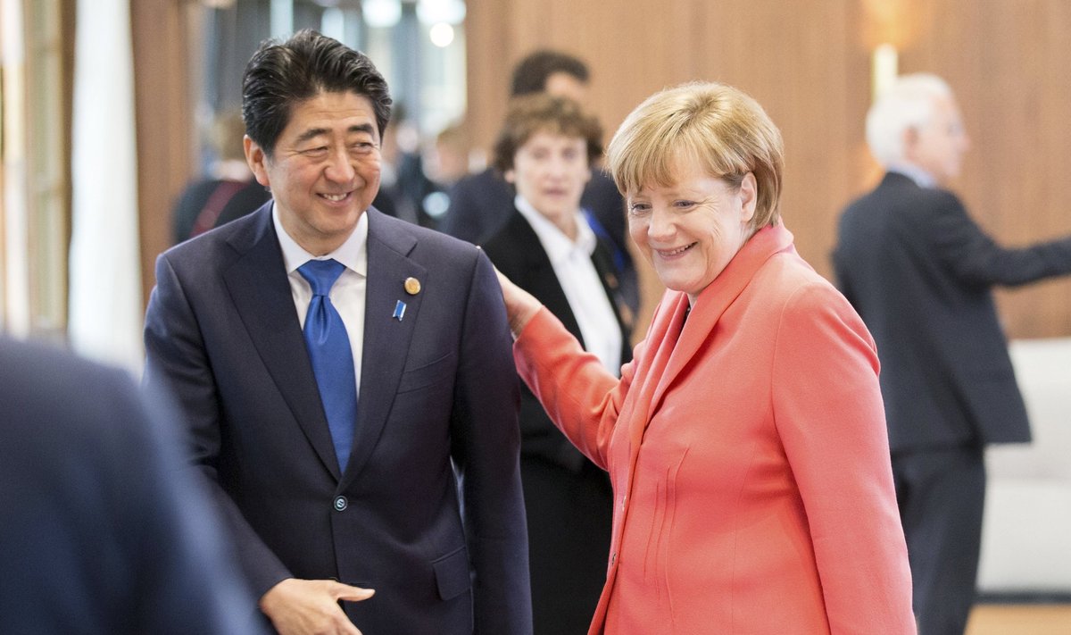 Shinzo Abe ir Angela Merkel