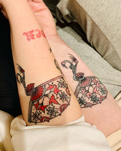 Evitos ir Ingos Cololo tatuiruotės