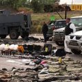 Kosovo policija parodė po operacijos vienuolyne konfiskuotus ginklus