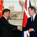 D. Cameronas gina su Kinija sudarytus sandorius