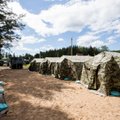 В палатках в Пабраде проживают 94 мигранта, выявлено 10 случаев COVID-19
